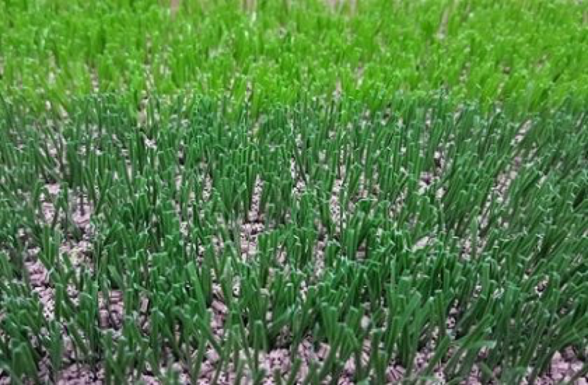 How is artificial grass created?