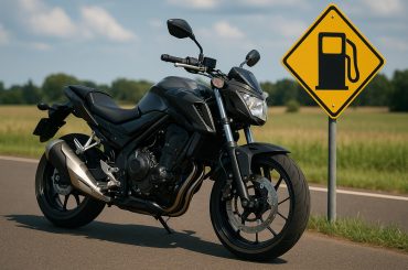 Sport motorcycle on highway illustrating the impact of riding style on fuel efficiency.